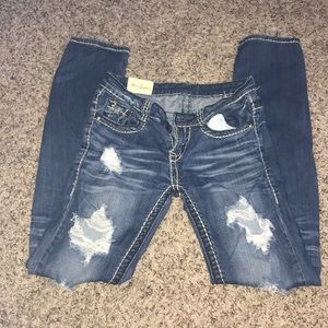 Ripped Straight Legged Jeans